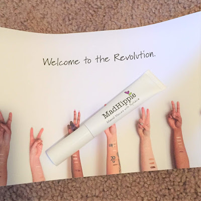 A picture of the Mad Hippie Mineral Mascara over the paper it came with that says, Welcome to the Revolution