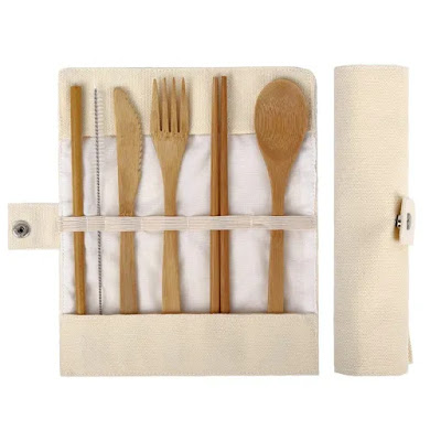 A picture of a set of bamboo eating utensils for zero waste dining