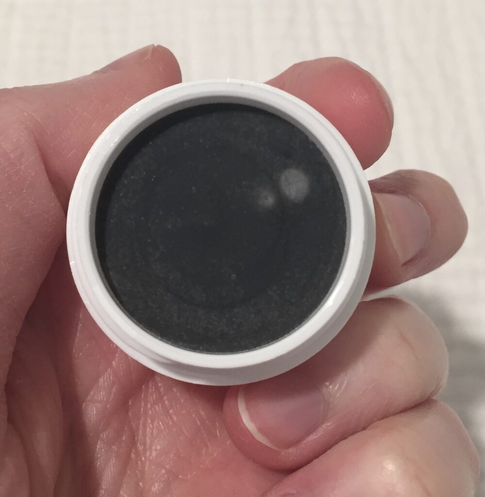 A picture of activated charcoal natural deodorant