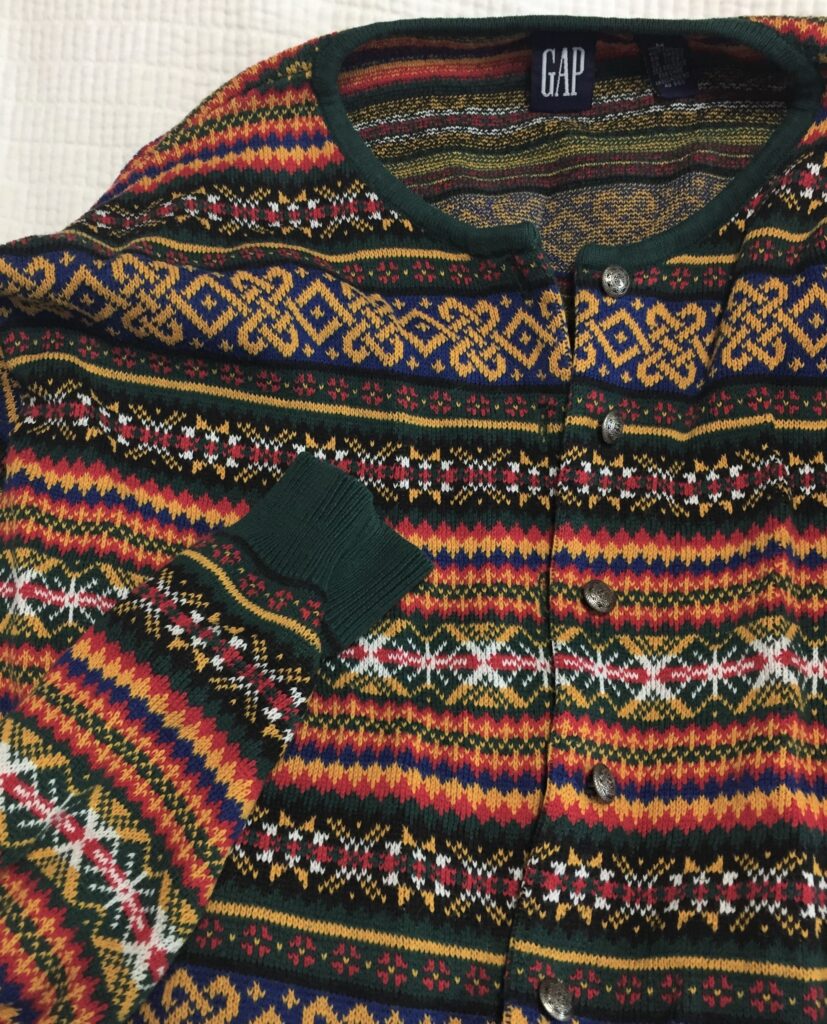 A picture of a rainbow GAP sweater