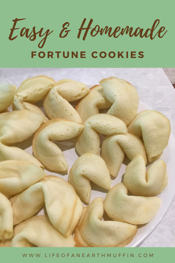 A picture of a plate of fortune cookies 