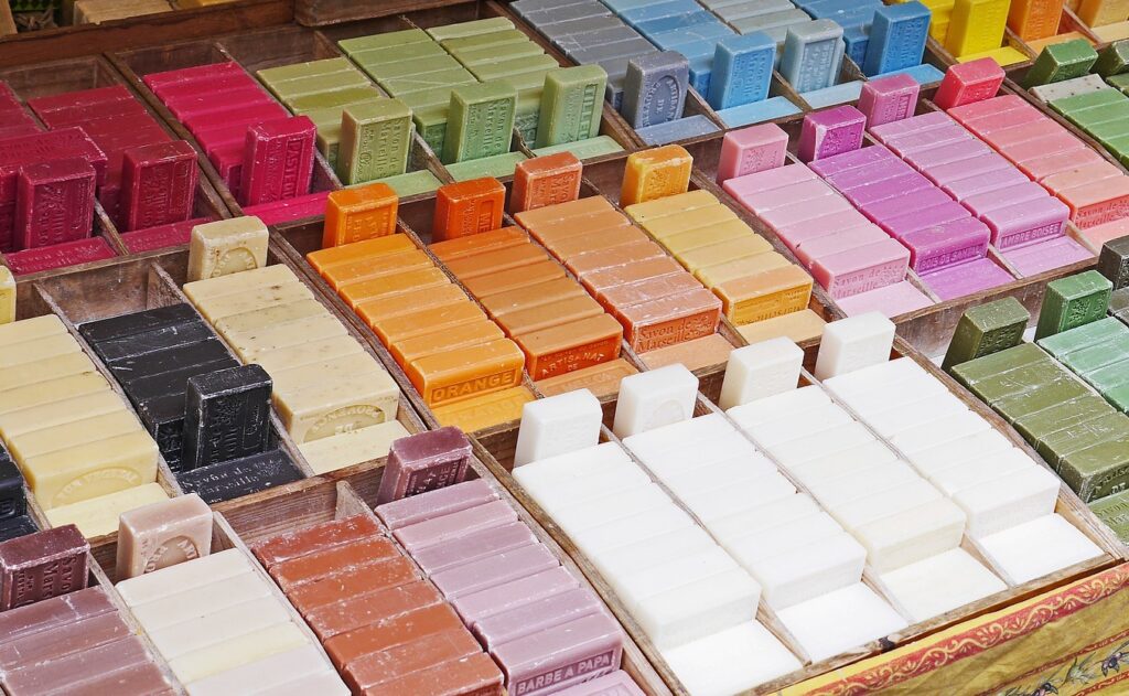A picture of bars of soap and shampoo in various colors