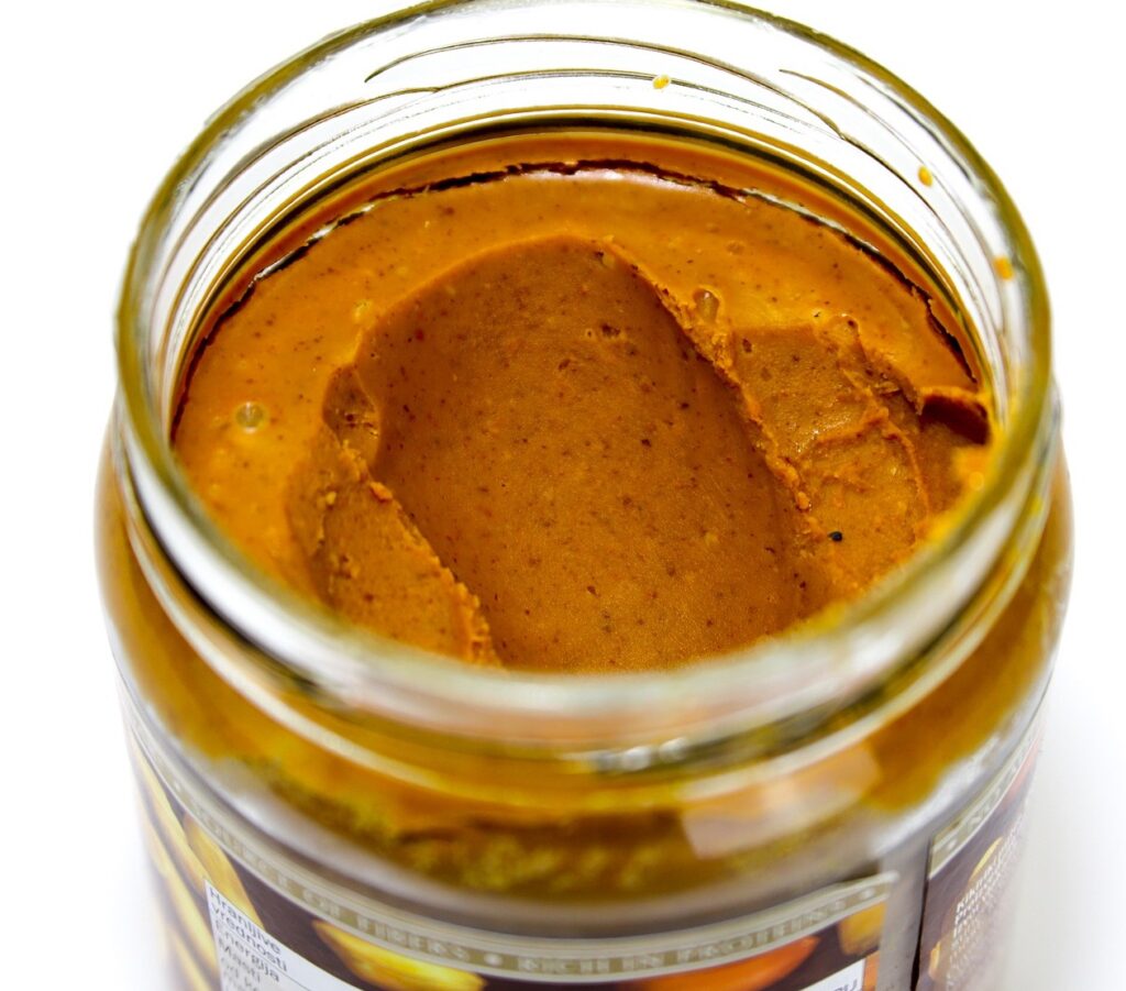 A picture of a jar of peanut butter