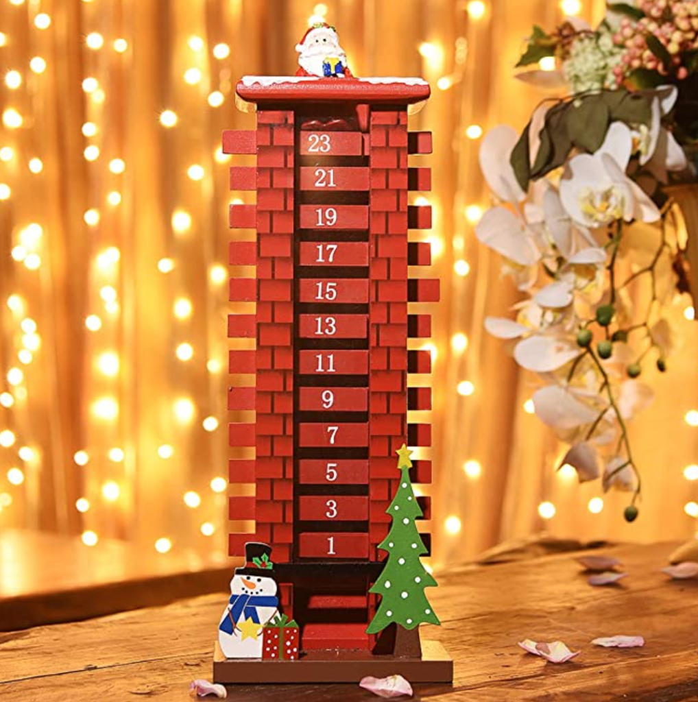 A picture of a wooden Santa in chimney countdown to Christmas 