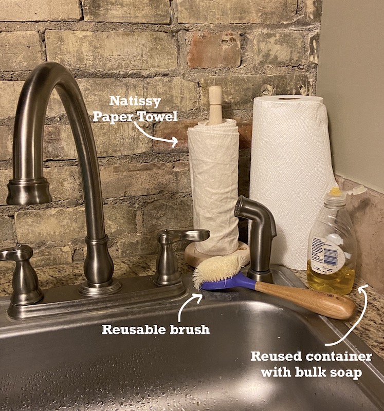 A picture of Natissy reusable paper towels next to typical paper towel at the kitchen sink