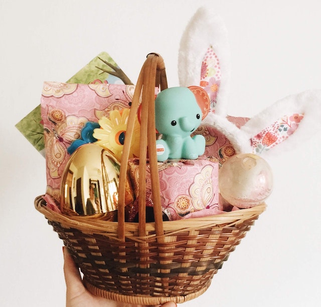 A picture of an Easter basket full of candy and toys