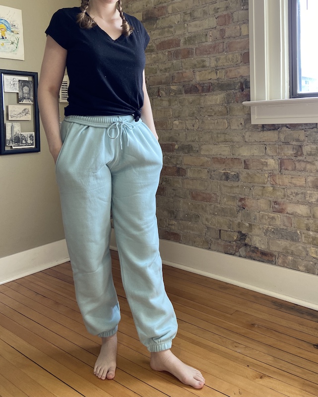 A picture of a girl wearing pastel blue loungepants from FemmLuxe