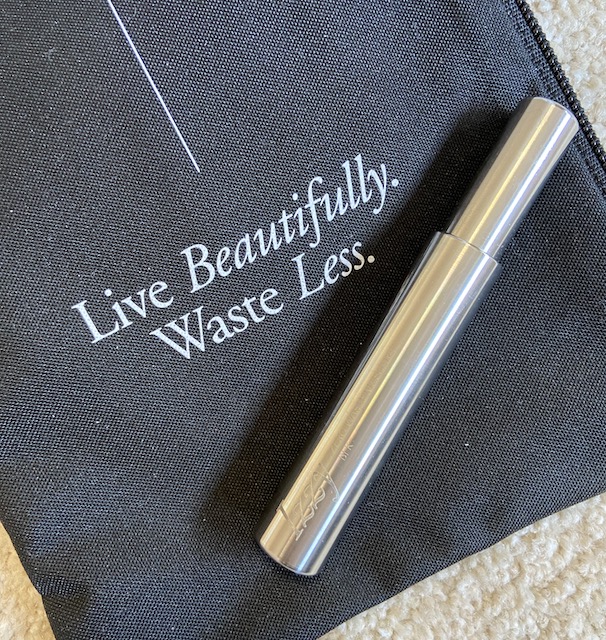 A picture of the zero waste Izzy Beauty mascara in a stainless steel mascara tube
