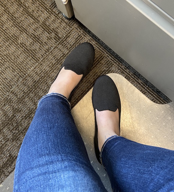 A pair of solid black Rothy's loafers