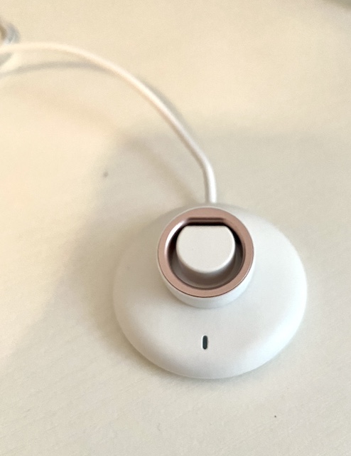 femometer smart ring on charger